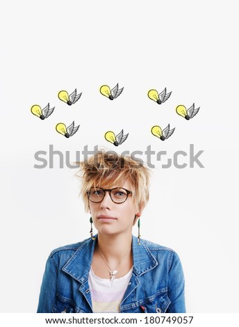 Sad woman with flying ideas