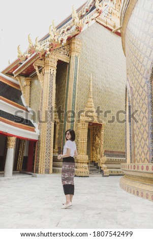 Photographer girl in temple of thailand
