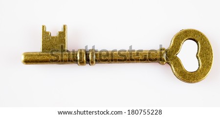 antique golden door key isolated on white background