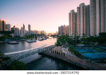Aberdeen Harbour seen from Ap Lei Chau Bridge, In this area you will find yacht, fishing boats, houseboats, and sampans, The bay between the south coast of Hong Kong Island, in sunset time