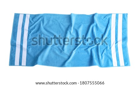 Blue towel isolated on white, top view. Beach accessory Royalty-Free Stock Photo #1807555066
