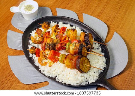 Roasted vegetables n A Tray with white rice stock photo