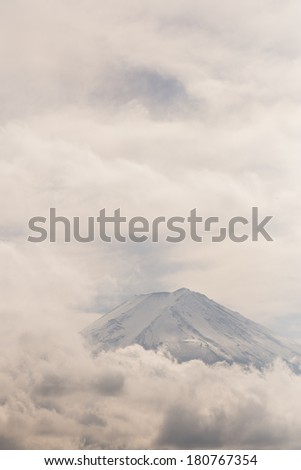 View of top of Fuji mountain in cloud from Kawaguchiko, Japan