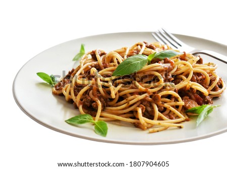 Spaghetti Bolognese with minced beef, onion, chopped tomato, garlic, olive oil, stock cube, tomato puree and Italian herb. Traditional Italian food.