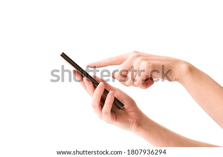 woman holds a smartphone in her hands and clicks on the screen. isolated white background Royalty-Free Stock Photo #1807936294