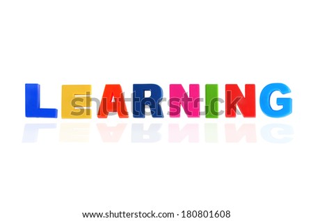 LEARNING written In Multicolored Plastic Kids Letters