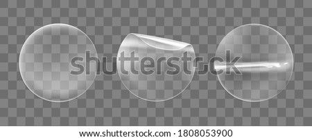 Transparent round adhesive stickers mock up set isolated on transparent background. Plastic crumpled round sticky label with glued effect. Template of a label or price tags. 3d realistic vector mockup Royalty-Free Stock Photo #1808053900