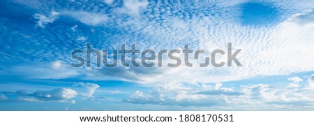 Air clouds in the blue sky.Blue backdrop in the air. Abstract style for text, design, fashion, agencies, websites, bloggers, publications, online marketers, brand, pattern, model, animation,