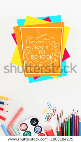 Colorful school supplies corner border over a white background. Education, school time