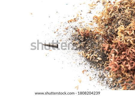Colorful pencil shavings isolated in white background