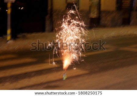 Fireworks explosion on a pedestrian crossing