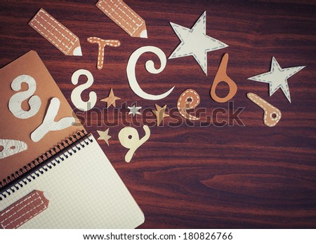 "Back to school"Vintage Style background/ Vintage school elements set with paper elements on old wooden background/School background concept