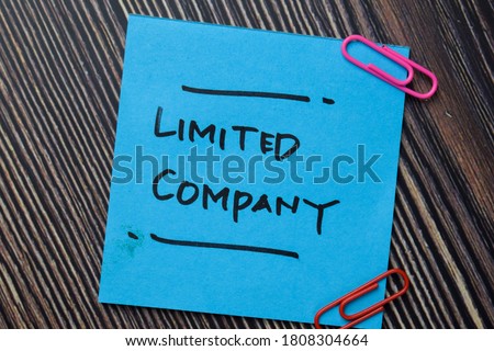 Limited Company write on sticky notes isolated on office desk. Royalty-Free Stock Photo #1808304664
