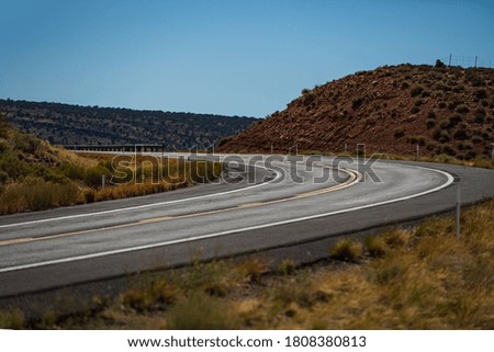 Landscape scene and sunrise above road. Asphalt highway road. Scenic highway in Arizona-Utah, America