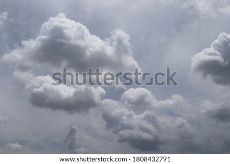 Blue sky and white cloud background closeup.