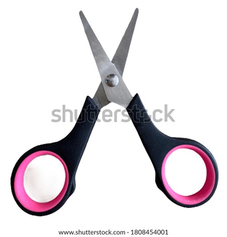 small scissors commonly used as a tool for cutting paper.