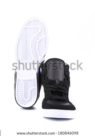 Top side and sole of fashion sneakers. Isolated on a white background.