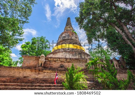 Background of religious tourist attractions in Mae Nang Pluem temple, Ayutthaya province of Thailand, large ancient pagodas and beautiful churches, allowing tourists to make merit and take pictures.