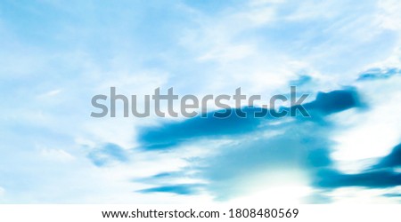Beautiful blue sky and white clouds of various shapes with sunlight. Nature background Royalty-Free Stock Photo #1808480569
