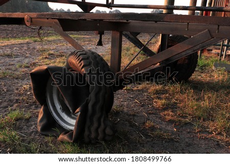 the scorched car tire on the trailer

