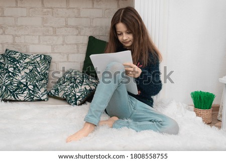 child girl writes a letter