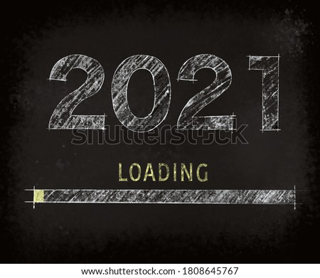 Year 2021 loading text on black board. Royalty-Free Stock Photo #1808645767