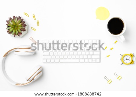 Keyboard and stationary on white workspace mockup
