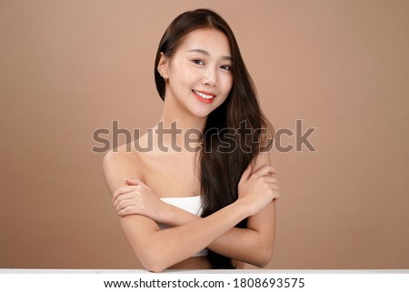 Asian beauty woman with natural makeup, cosmetic and plastic surgery concept, Isolated mocha brown background