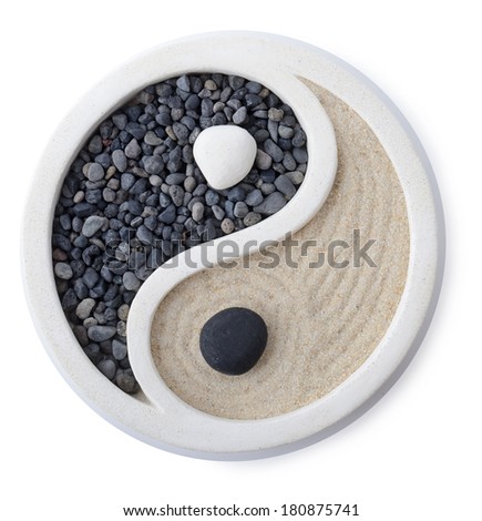 a small zen garden ying yang symbol isolated on white Royalty-Free Stock Photo #180875741