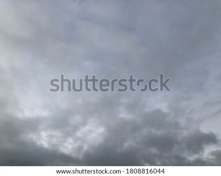 Atmosphere of overcast dusk sky before to rainy. Moody natural weather background. Dramatic storm cloudy and dark sky. Dark clouds over sunset sky.