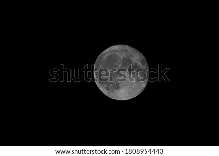 A beautiful view of a full moon on a black background. 