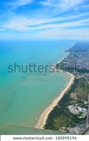 Daytime view from a flying plane at high altitude. Coast. Coastline of Thailand.