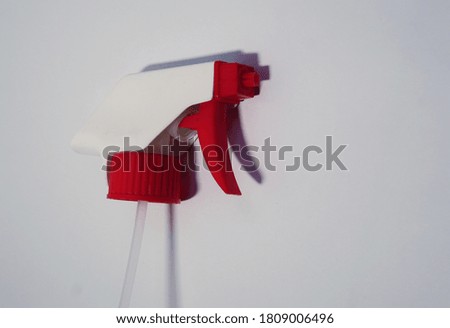 red and white spray head