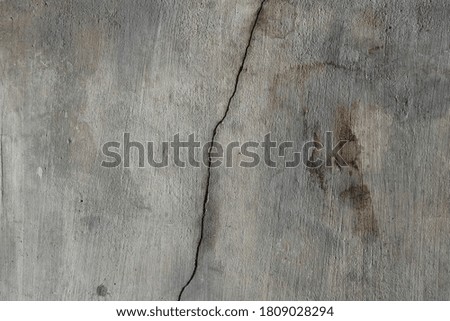 Close Up of an Old Exterior Wall of Concrete with Cracks

