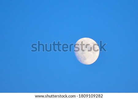 Full Moon with blue dusk sky background