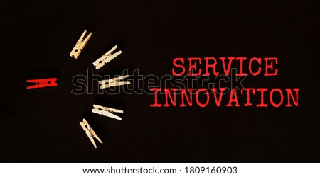 red and brown text Service Innovation on the black background
