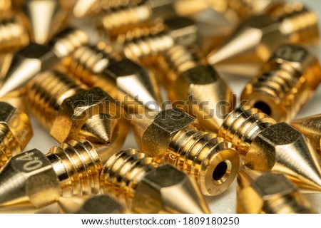 Macro Photo of Multiple Brass FDM 3D Printer Nozzles