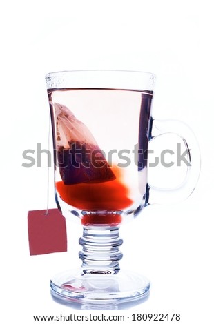 A glass of tea on white background