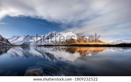 Lofoten islands, Norway. Panoramic landscape. Long exposure photography. Reflection on the water. Winter landscape at the night time. Norway travel - image