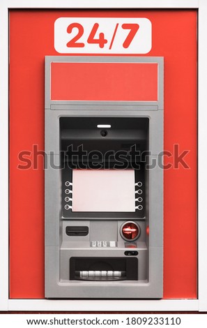 ATM machine, photo of one object in detail as a background, red color