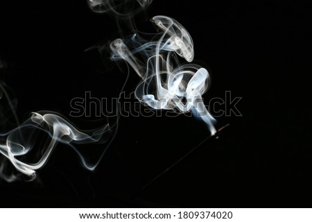 blue, yellow, white cigarette smoke incense smoke