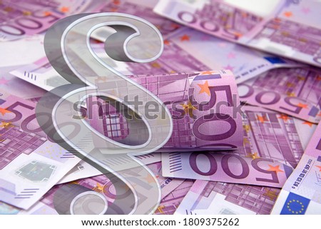 Paragraph with euro banknotes in the background