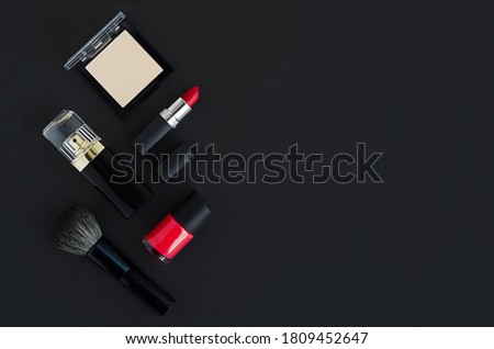 beauty sale. luxury branded decorative cosmetics product, perfume, make up on dark background, copy space, place for text. black Friday. gifts, present, discount for holidays. 