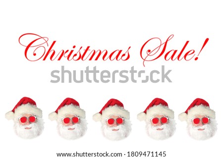 Santa Claus wearing Red Sunglasses isolated on white with "Christmas Sale!" text. 
Christmas Holiday Sales Sign. 
Text is replaceable with text or images. Clipping Path for designers use. 
