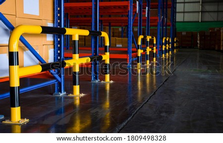 Steel bumper inside the warehouse. Prevent unsafe and dangerous operations. Bumpers do not provide forklifts and rack machinery. The steel bumper can prevent collisions in various places. Royalty-Free Stock Photo #1809498328