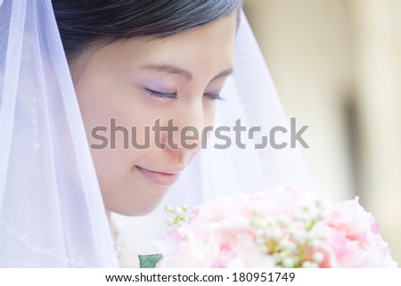 Japanese bride with her eyes closed