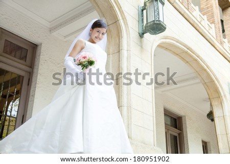 Japanese Bride standing in front of the mansion
