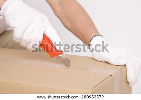 Japanese man preparing some cardboard Royalty-Free Stock Photo #180953579