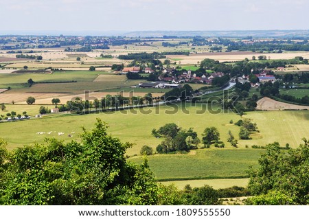 Burgundy valley, with the La Vandenesse waterway, seen from the town of Chateauneuf en Auxois Royalty-Free Stock Photo #1809555550