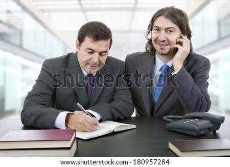 business team working at a desk at the office